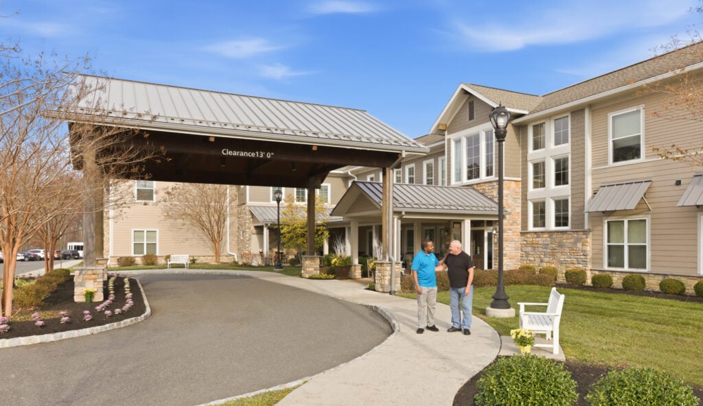Two residents talking outside of SLR Marlboro assisted living residences