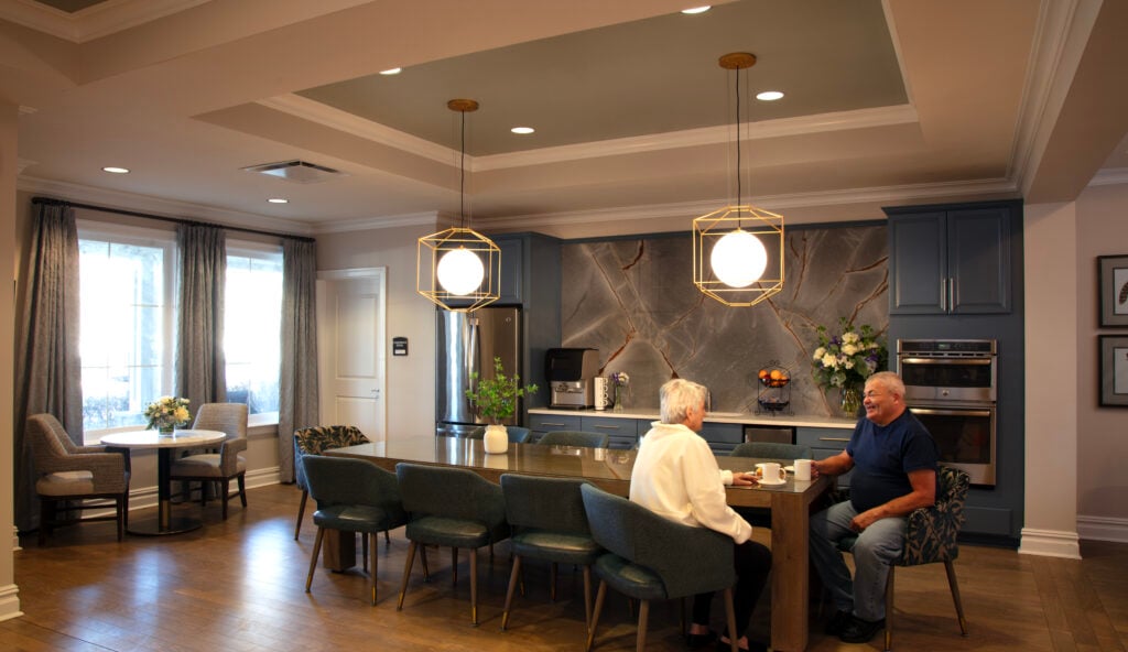 Two SLR Marlboro residents chatting over a cup of coffee in the Cafe