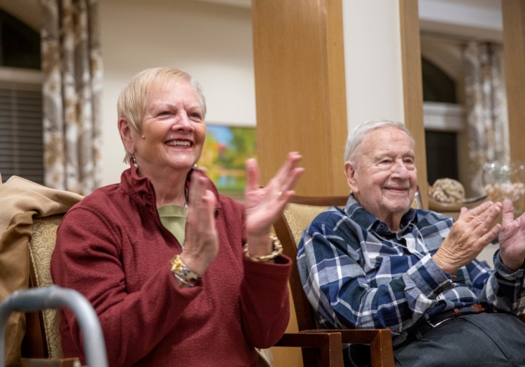Seniors clapping during an activity