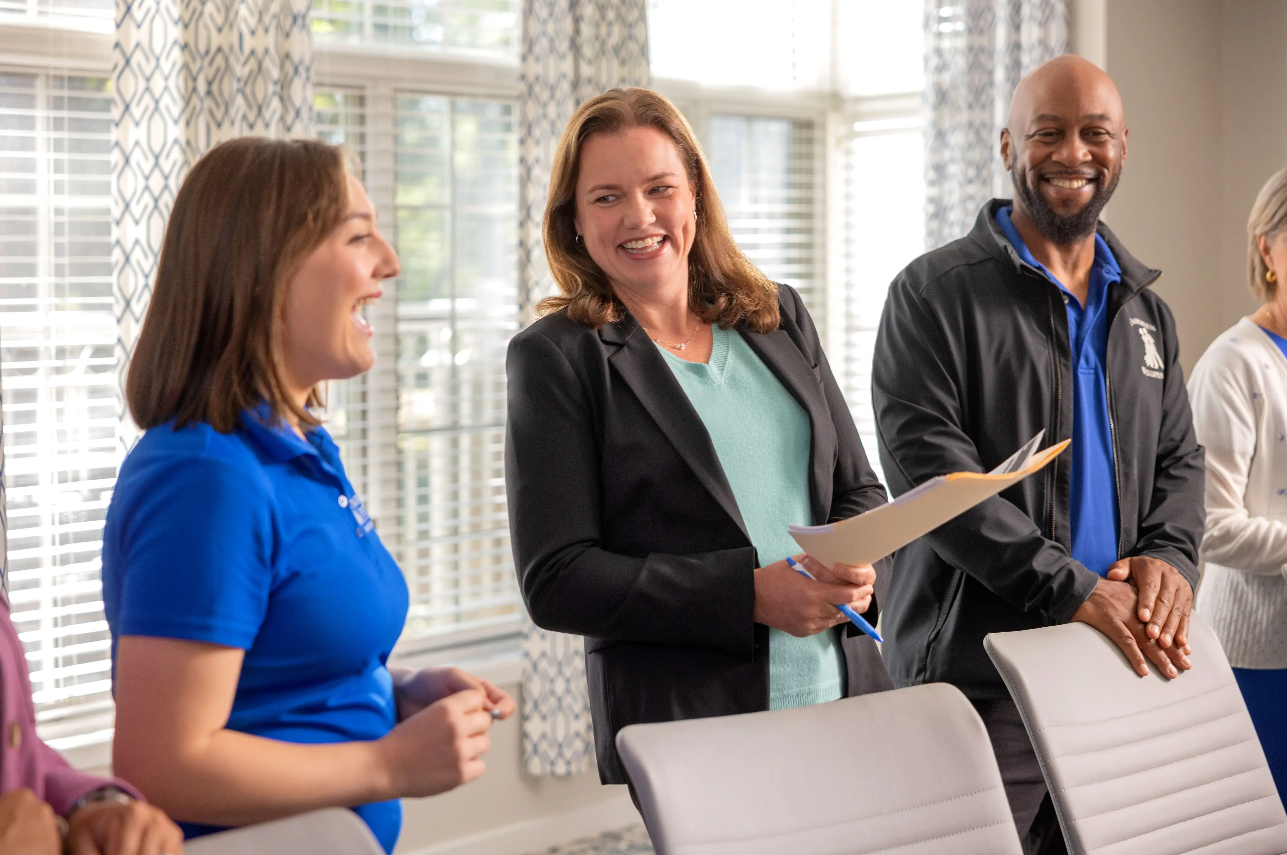 Senior Lifestyle employees smiling together